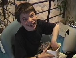 Kieron tucks into his packed food on Deck 7 of the ferry